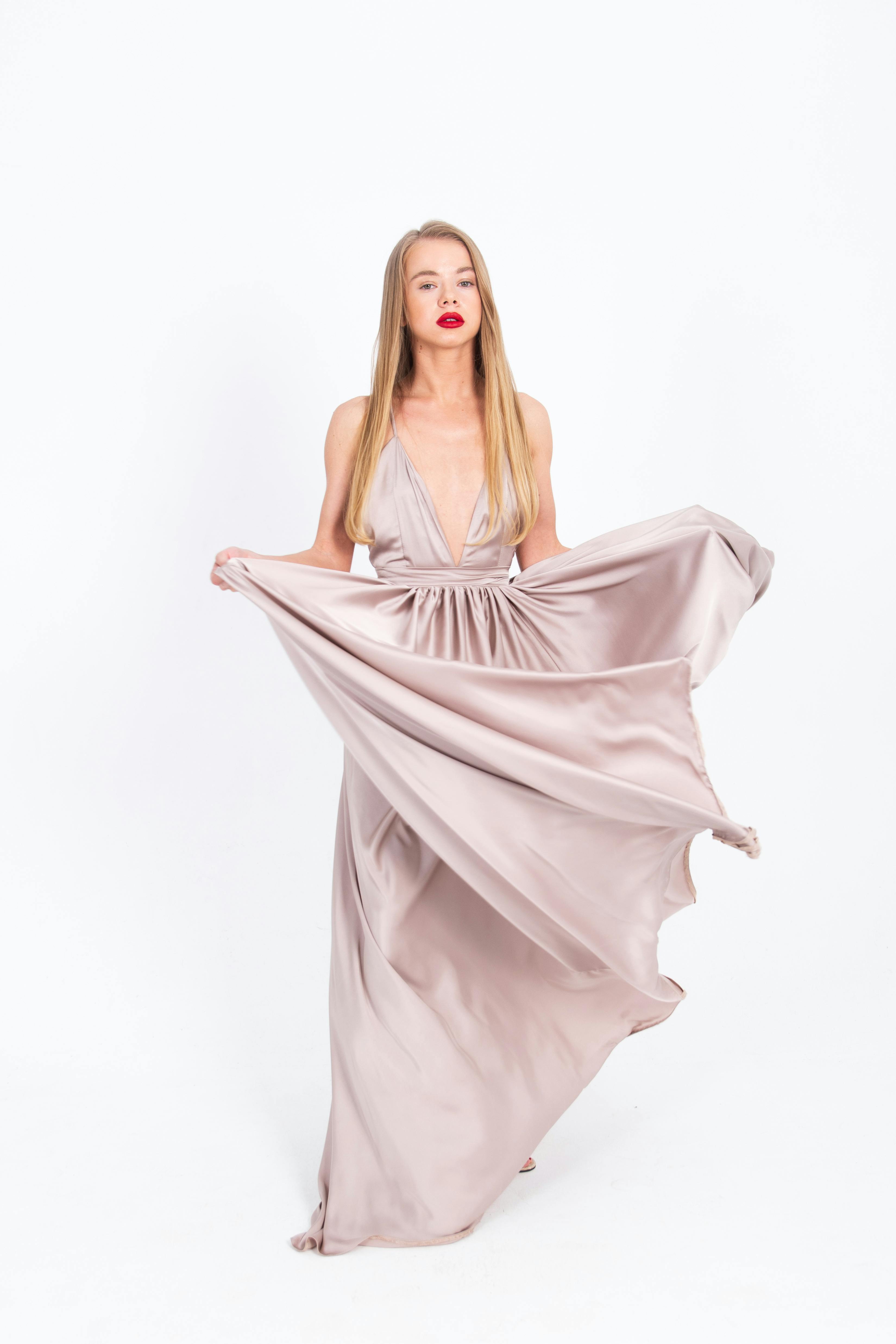 Input: casual photo of model in satin dress